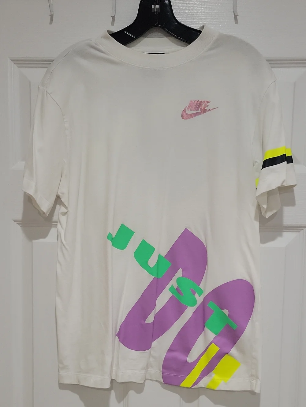 Nike White Tee with Pink Logo and Pastel Graphic